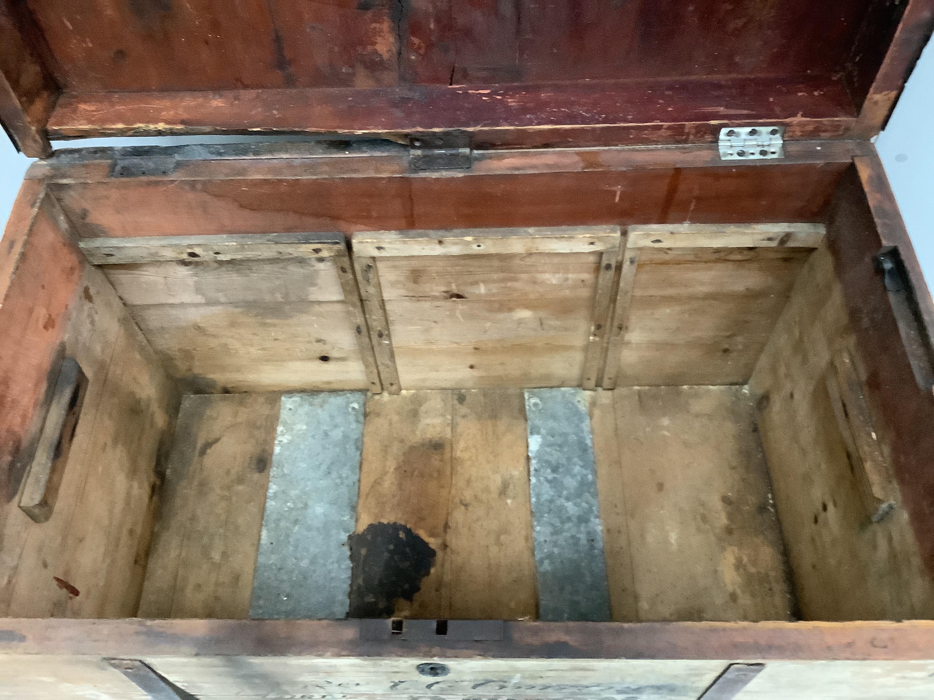 A vintage iron bound pine trunk width 107cm, depth 62cm, height 68cm.